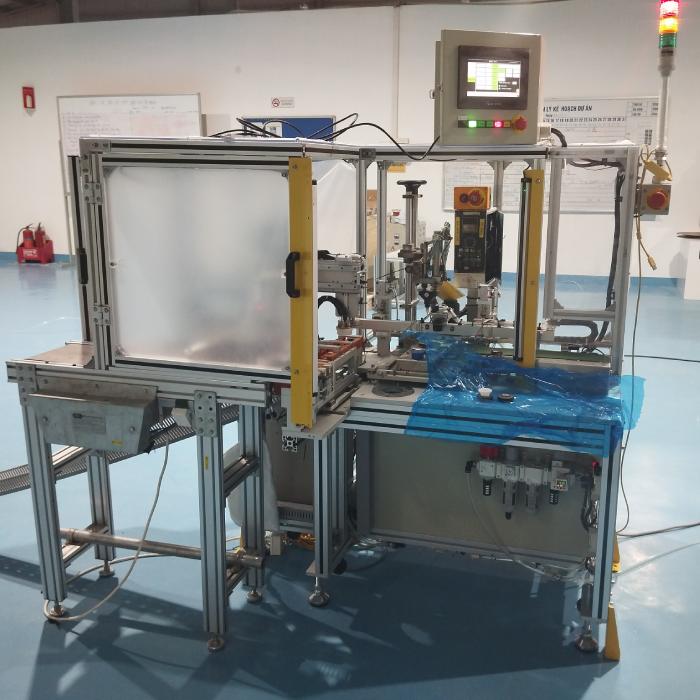 Máy bôi keo tự động